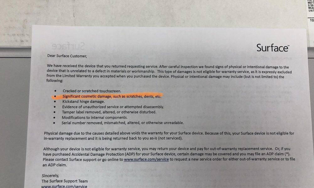 The letter about the "cosmetic damage". It voids the warranty, and we can't use it to replace the battery